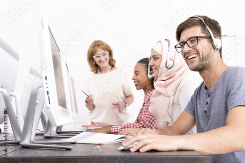 Photo Students sitting during the IT course