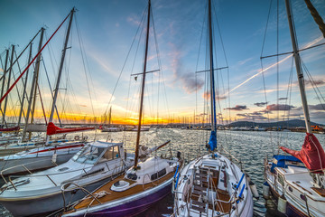 Wall Mural - boats in Alghero harbor at dusk