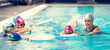 © Microgen - Swimming lesson in indoor swimming pool