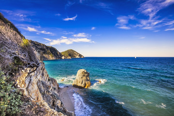 Wall Mural - Rock in a blue sea. Sansone beach. Elba island. Tuscany, Italy,