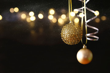 image of christmas festive tree gold ball decoration