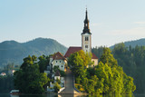 Fototapeta Krajobraz - Bled island closeup and pletna on Lake Bled in Slovenia