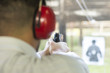 Shooting with Gun at Target in Shooting Range. Man Practicing Fire Pistol Shooting.