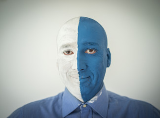 Blue and white face portait photo of a man