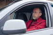 © retoncy - Aged man in the car