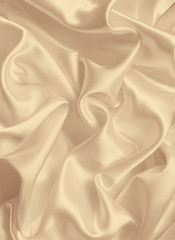 smooth elegant golden silk or satin texture as background. in se