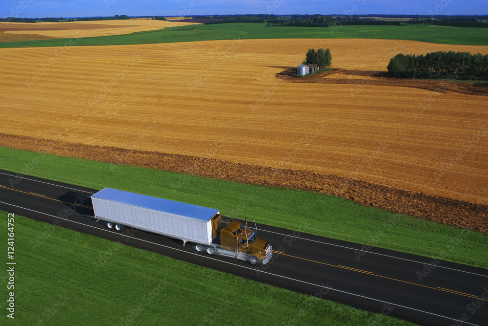Semi Truck On Small Two Lane Highway Stock Photo | Adobe Stock