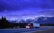 © Designpics - Semi truck on mountain highway, Alberta, Canada