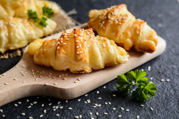 Wall Mural - Homemade savory croissants stuffed with Emmental cheese