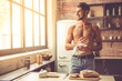 Sexy young man in kitchen