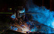 © bobo1980 - worker is welding assembly car parts in automotive industrial factory