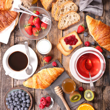Breakfast Composition With Coffee,tea,croissant And Fruit