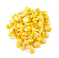 Ripe corn isolated. A few grains of canned corn on a white backg