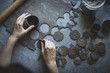 © The Picture Pantry - Cutting buckwheat dough in preparation for Pandowdy
