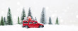 canvas print picture - Snowy Winter Forest with miniature red car carrying christmas presents