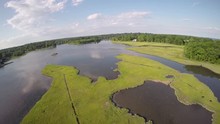 Aerial Beauty Shot Over Water, New England, Sherwood Mill Pond, Westport Connecticut USA.