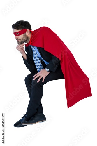 Fotografie, Obraz Businessman pretending to be a super hero