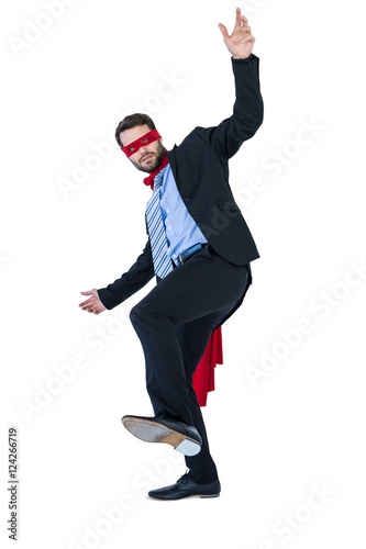 Fotografie, Obraz Businessman pretending to be a super hero