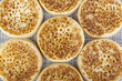 Close up of fresh crumpets on a woven table mat