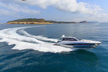 Wall Mural - luxury motor boat, rio yachts italian shipyard, aerial view