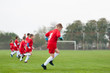 © marritch - Young soccer team warming up before game