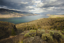 Scattered Clouds Over Kamloops Lake And The Dry Hills Surrounding It;Kamloops, British Columbia, Canada
