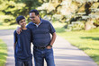 © Designpics - Father and son spending quality time together walking in a park; Edmonton, Alberta, Canada