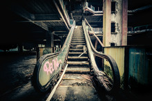 Dramatic View Of Damaged Escalators In Abandoned Building. Apocalyptic And Evil Concept