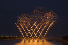 Fireworks Reflecting On A Lake; Calgary, Alberta, Canada