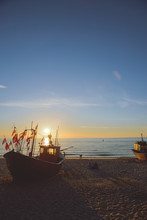 Fisherman Boats At Sunrise Time On The Beach