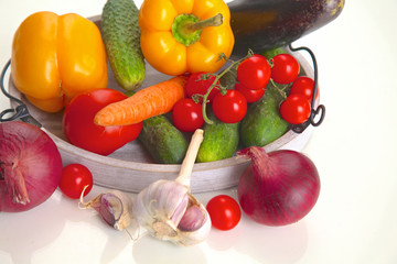 Wall Mural - Fresh autumn vegetables on a white background