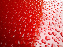 Red Water Drops Background With Reflect Light