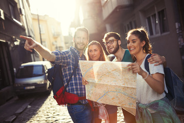 happy traveling tourists sightseeing