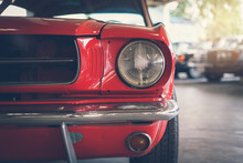 Close Up Headlight Of Red Retro Classic Car