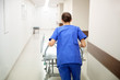 © Syda Productions - nurse carrying hospital gurney to emergency room