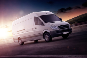 White van for freight haulage on a freeway