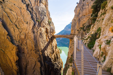 Road to the old beautiful and a very narrow bridge between two s