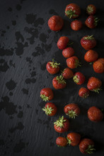Strawberries On Black Slate. Top View.