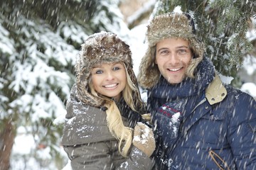 Wall Mural - Winter portrait of happy loving couple