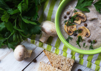 Wall Mural - Mushroom puree soup with allspice, parsley, champignons and toas