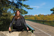 © Rob Rye - Portrait of man with a long beard and a long hair on the bridge