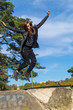 © Rob Rye - Man with a long beard and a long hair flies like a bird