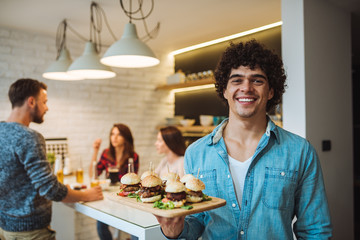 Wall Mural - Bringing burgers to the friends