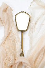 Top View Image Of Vintage Hand Mirror And Lace Scarf