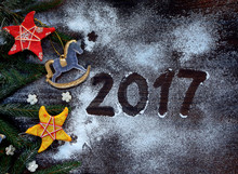 New Year And Christmas Background. Greeting Card With Xmas Ornaments, Conifer Branches. Winter Holidays Concept. Year 2017 Of Rooster. Space For Text.