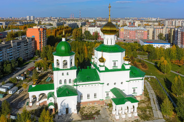 Wall Mural - Tyumen, Russia - September 26, 2016: Aerial view on temple chapel in honor of Lady Day