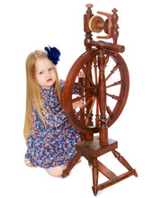 The Girl Looks At The Spinning Wheel