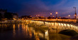 Paris bridge at night