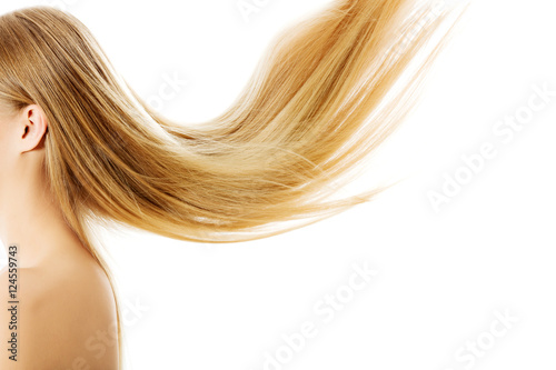 Plakát Beautiful long blonde hair, isolated on white.