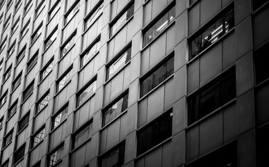 windows of business building in Hong Kong with B&W color